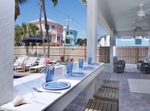 Have a meal overlooking the pool