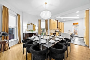 Dining Area: Host unforgettable dinners in this elegant dining room, seamlessly connected to a gourmet kitchen.