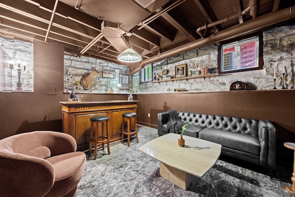 Bar: Mix up your favorite drinks at this unique and stylish bar area, perfect for evening relaxation. (Alcohol shown for display only and is not for guest consumption.)