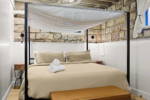 Bedroom 1: Experience restful nights and bright mornings in this charming bedroom, designed for peace and comfort.
