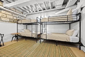 Bedroom 2: Maximize your fun with this cleverly designed bedroom featuring comfortable bunk beds – ideal for groups and family getaways.