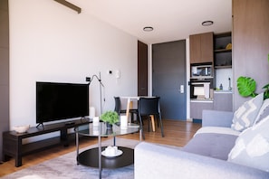 Chic and cozy living space with a modern touch, perfect for relaxing or entertaining.