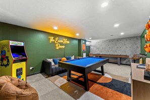 Basement Game Room loaded with fun. Pool Table, Shuffle Board Table, Arcade Game and Smart TV