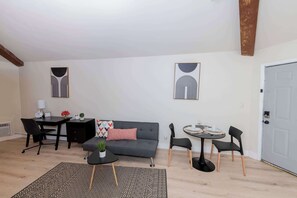 Living and dining area with remote-work friendly space