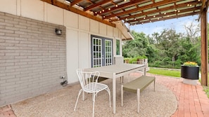 Private outdoor patio with dining area