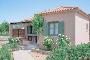 Private Cottage Entrance with Lush Garden
