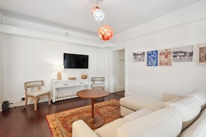 Spacious Living Area with TV