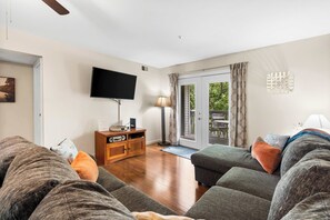Curl up in the breezy living room & stream your favorites on the smart TV