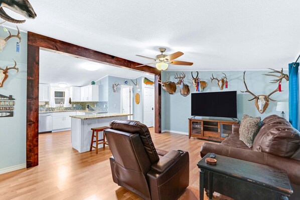Curl up in Unit 436’s cozy living room & stream your favorites on the smart TV