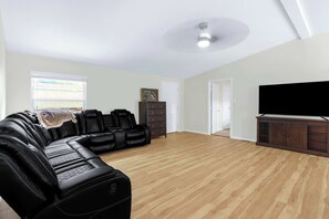 Stream your favorites in style in Unit 432 on the living room’s smart TV