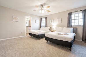 Master bedroom with two full beds