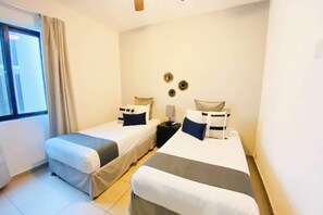 2 Single beds in the second bedroom