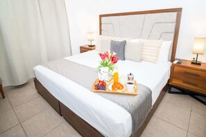 Main bedroom with A/C, TV, walking closet, private bathroom