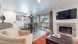 Furniture, Indoors, Living Room, Table, Fireplace