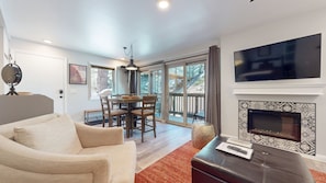 Furniture, Indoors, Living Room, Table, Fireplace
