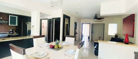 Enjoy a sit-down meal at home at this elegant dining table