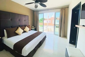 A luxe king bed, Smart TV and access to the balcony