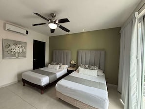 Bedroom 3 has 2 double beds