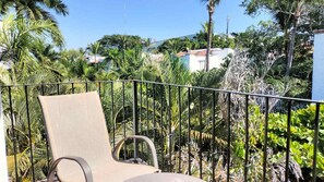 Tropical jungle view from this 4th floor apartment, breath taking sunrises and sunsets.