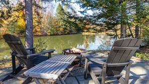 gorgeous pond side fire pit
