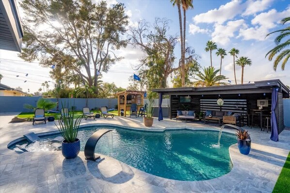 The private pool is the centerpiece of this outdoor paradise.