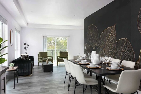 "Gather around our elegant dining table."
