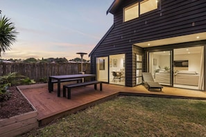 Private, sunny garden with outdoor dining