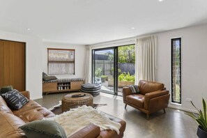 Open plan living with doors to the private garden
