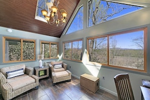 Sun Room with Desk and Mountain/River View