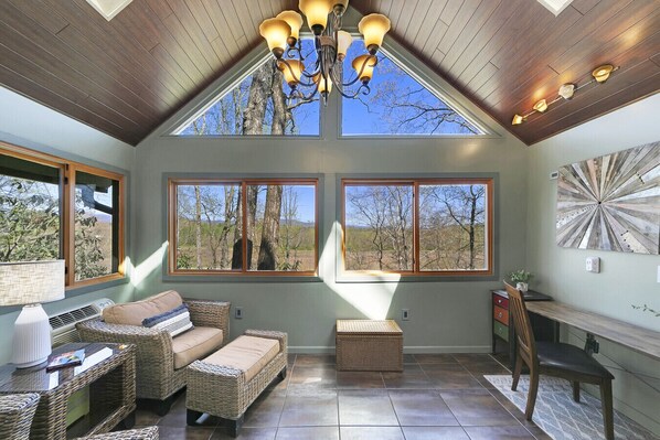 Sun Room with Desk and Mountain/River View