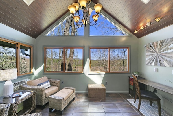 Sun Room with Desk and Mountain/River View