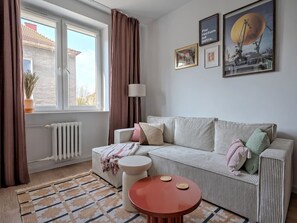 Living Room with Sofa Bed, Smart TV and Dining Table | Book Now with RENTUJEMY.COM