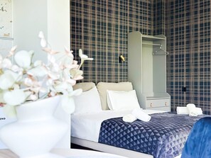 Rest in a serene, beautifully designed bedroom — the perfect space to unwind. Want extra pillows or local relaxation tips? Just ask!