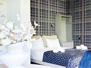 Rest in a serene, beautifully designed bedroom — the perfect space to unwind. Want extra pillows or local relaxation tips? Just ask!