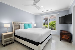 Each of the three stylish bedrooms features a king-size bed, ensuite bathroom, Smart TV, and ample storage—your private retreat after a day in paradise.