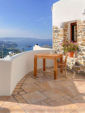 Cosy terrace with ample sitting space and panoramic view of the village, the sea and the countryside