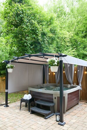 Roast s’mores by the wood-burning fire pit or slip into the spacious hot tub