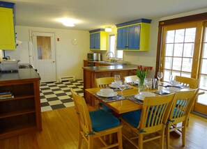 Open kitchen/dining. Plenty of counter space. 