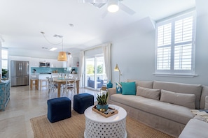 Open-concept living room, dining area, and kitchen