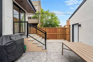 Fully-fenced backyard with a 6-person hot tub & a BBQ. Please note that this is a shared space with the upper-level guests (if present.)