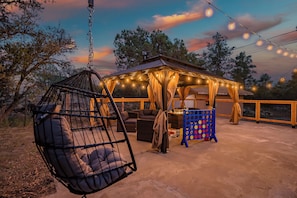 Serenity under the pines—sink into this cozy egg chair and soak in the crisp Prescott air