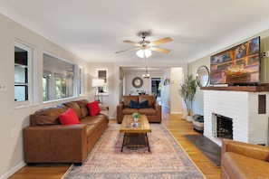 Cozy seating for 6-8 around the large screen smart tv
