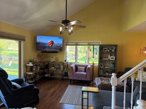 Spacious living room with river views. Smart TV with soundbar.