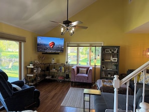 Spacious living room with river views. Smart TV with soundbar.