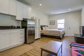 Queen bed and couch for lounging