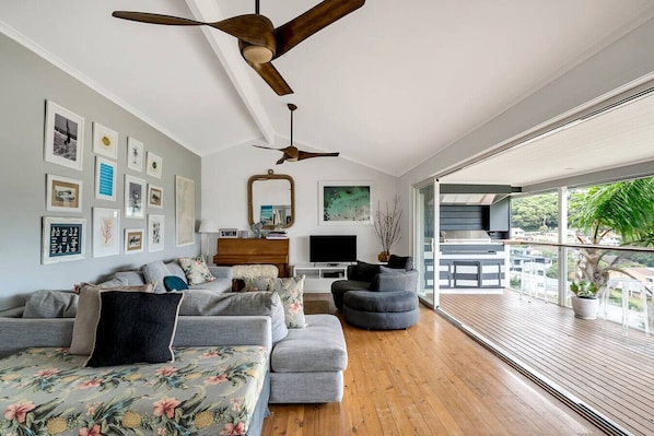 Chic coastal retreat with stylish décor, open living, and a breezy balcony—your perfect beachside escape! By Superhostly