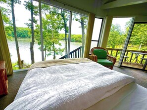 Wake up to breathtaking lake views from the comfortable master bedroom, designed to bring the beauty of the outdoors inside