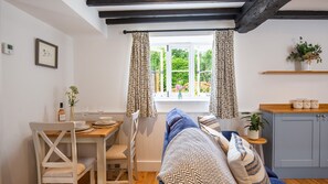 The exposed beams and little touches create a quintessential Cotswolds feel