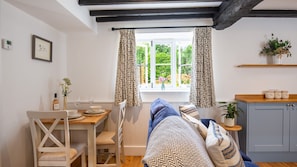 The exposed beams and little touches create a quintessential Cotswolds feel