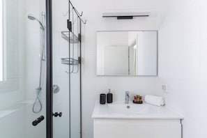 Minimalist shower area and wash area